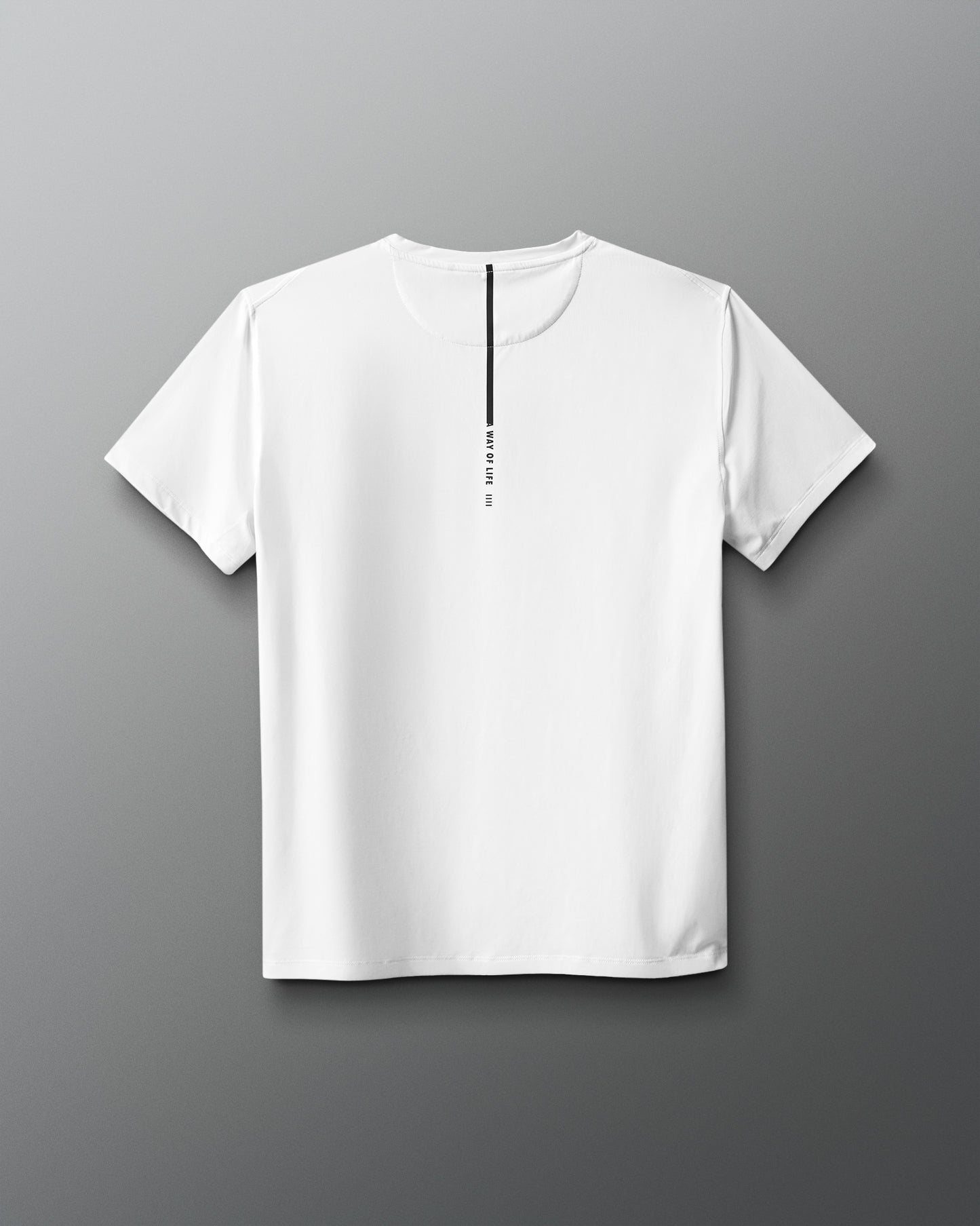 White t-shirt with a small black logo on a gray background