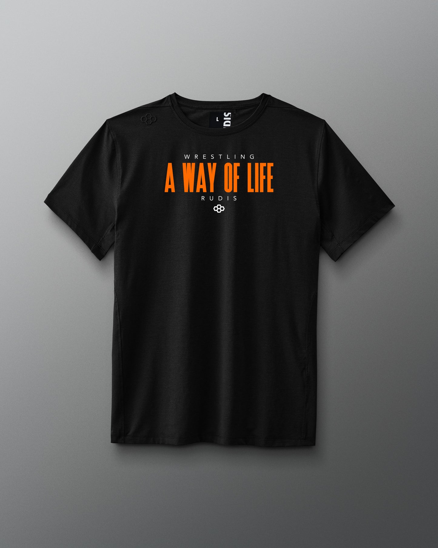Black t-shirt with 'Wrestling A Way of Life' text on a gray background