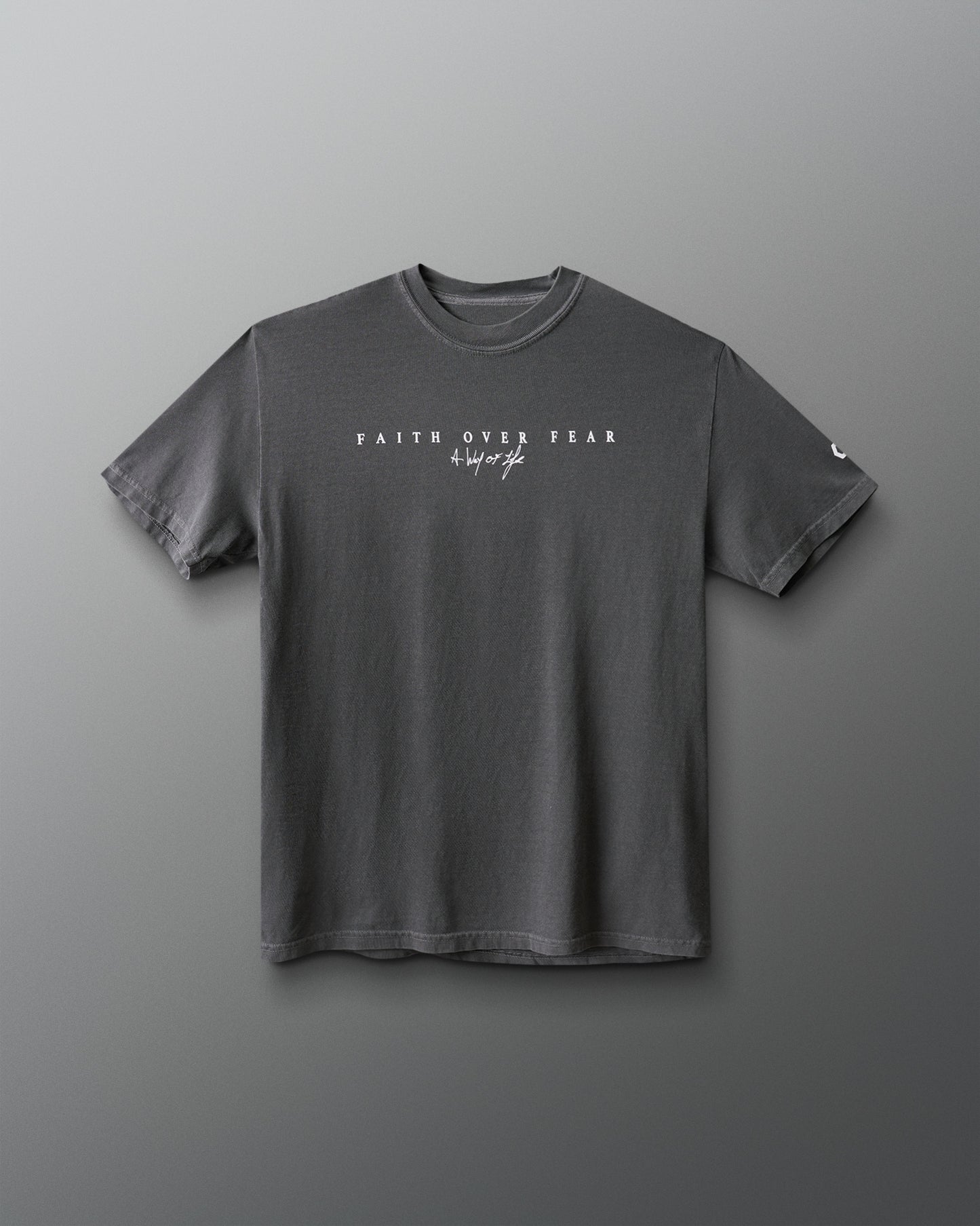 Gray t-shirt with 'Faith Over Fear' text on a gray background