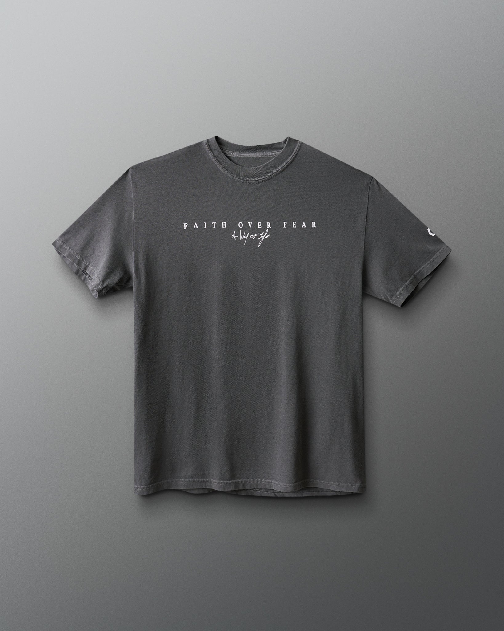 Gray t-shirt with 'Faith Over Fear' text on a gray background
