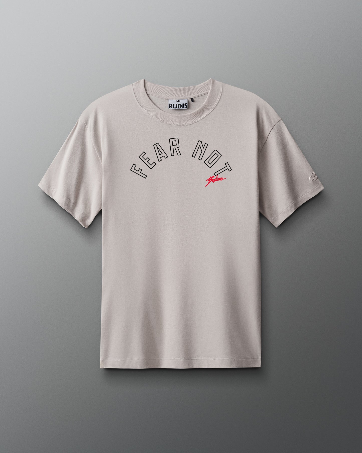 Beige t-shirt with 'FEAR NOT' text on a gray background