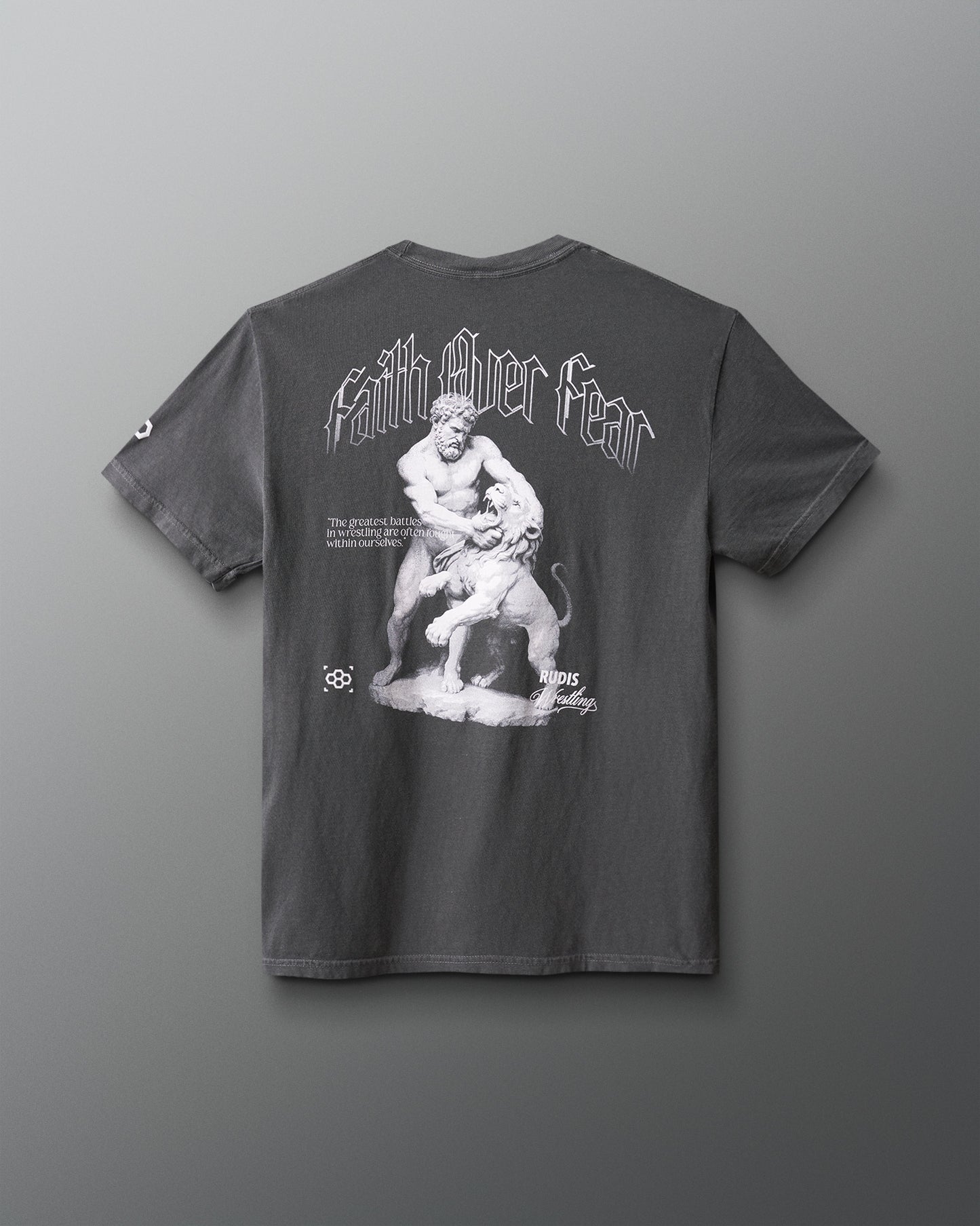 Gray t-shirt with a graphic design on the back against a gray background