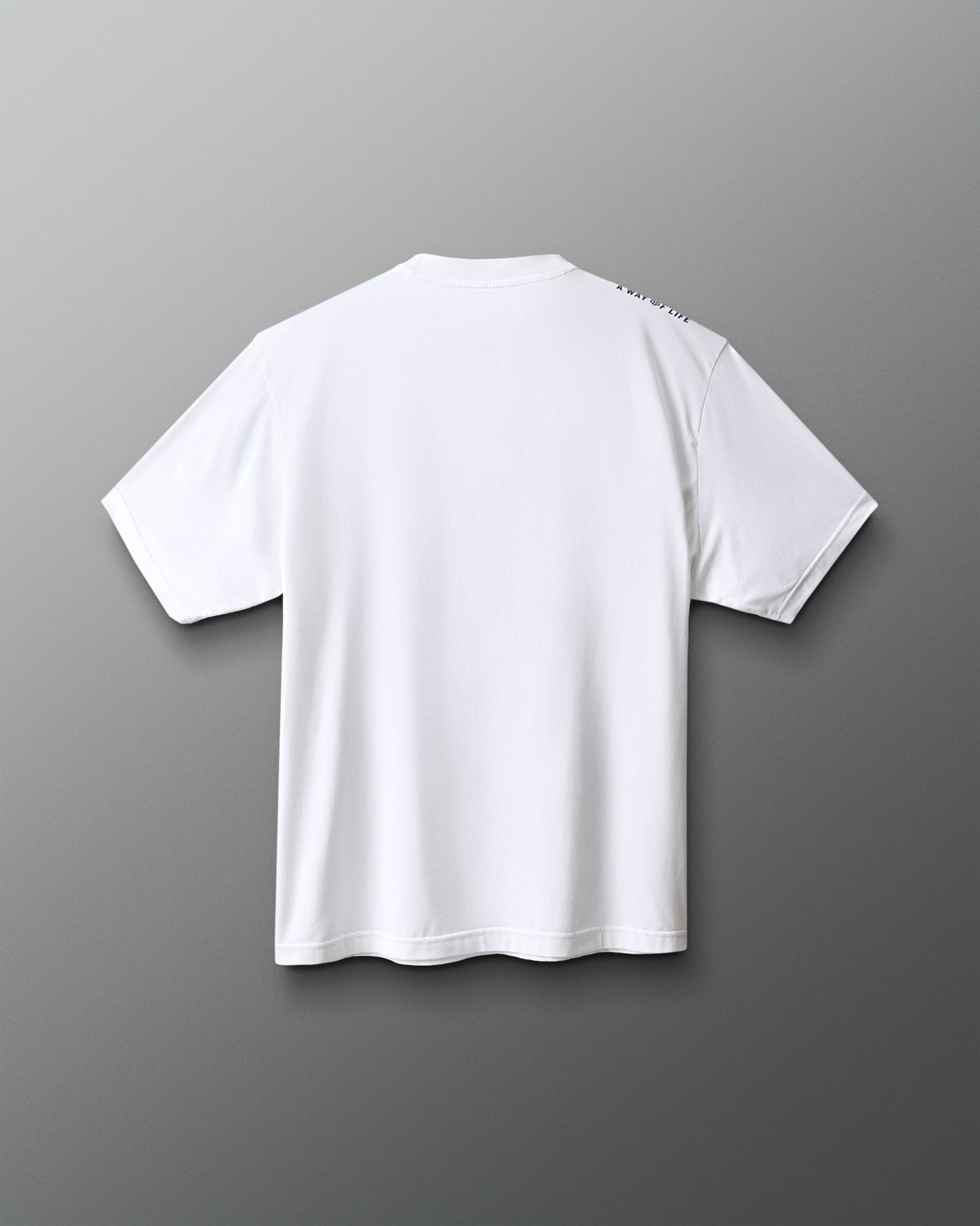 White t-shirt on a gray background