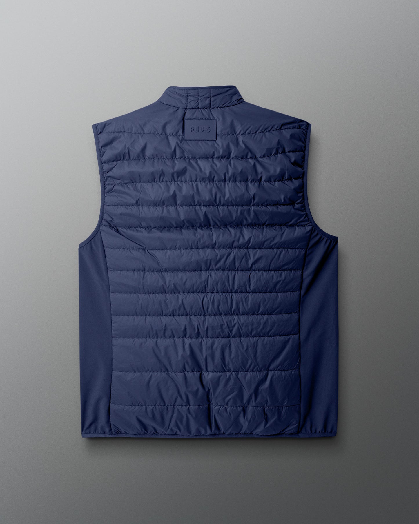 Blue puffer vest on a light gray background
