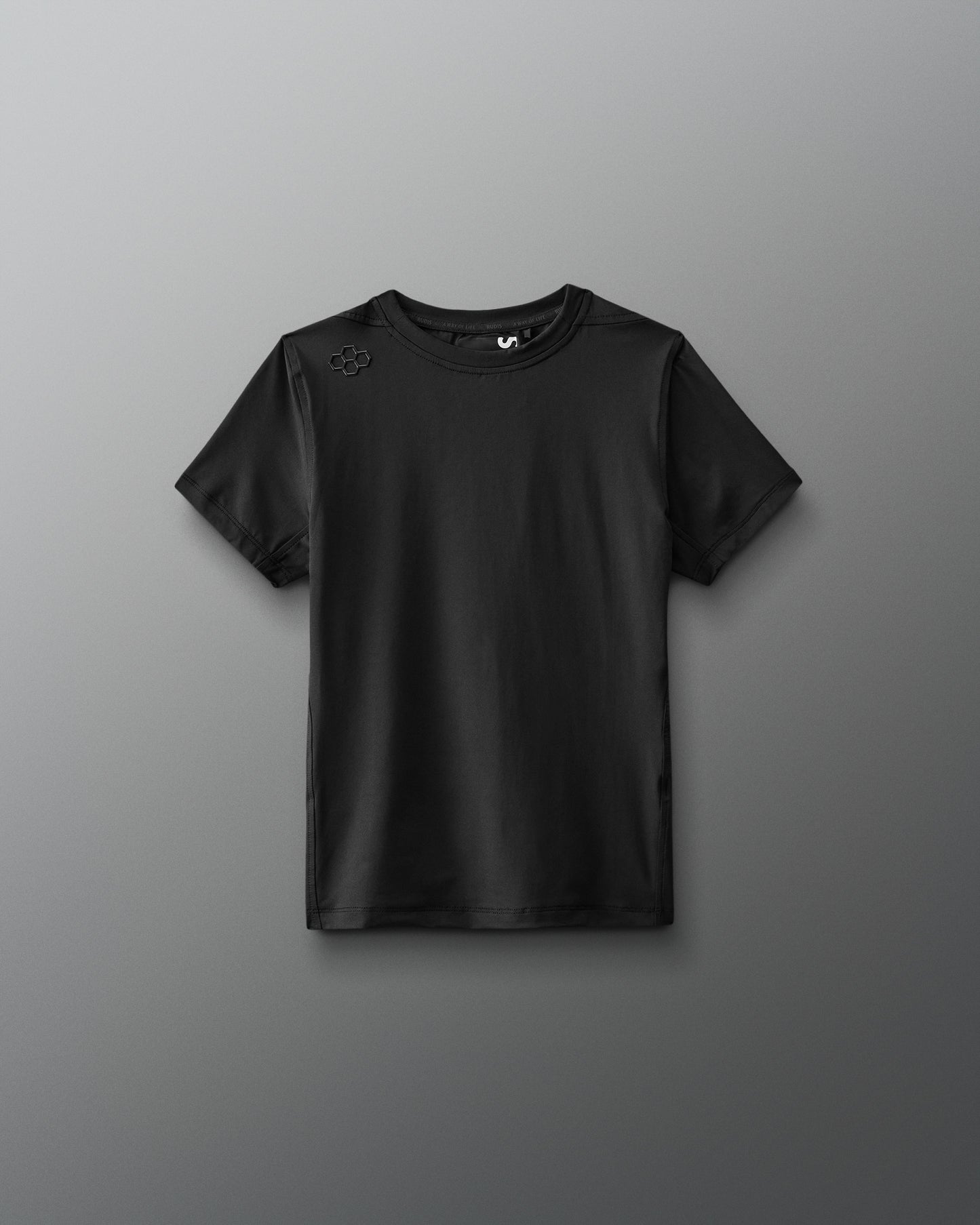 A black athletic t-shirt with short sleeves and a crew neckline, featuring a subtle honeycomb logo, designed for comfort during workouts.