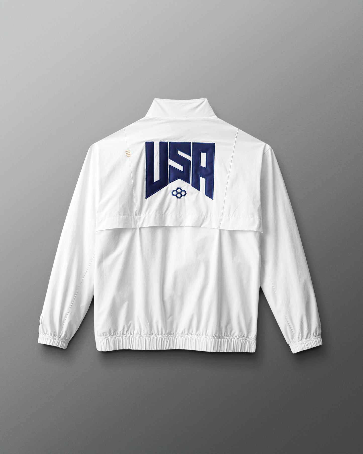 White jacket with 'USA' logo on a red and blue gradient background