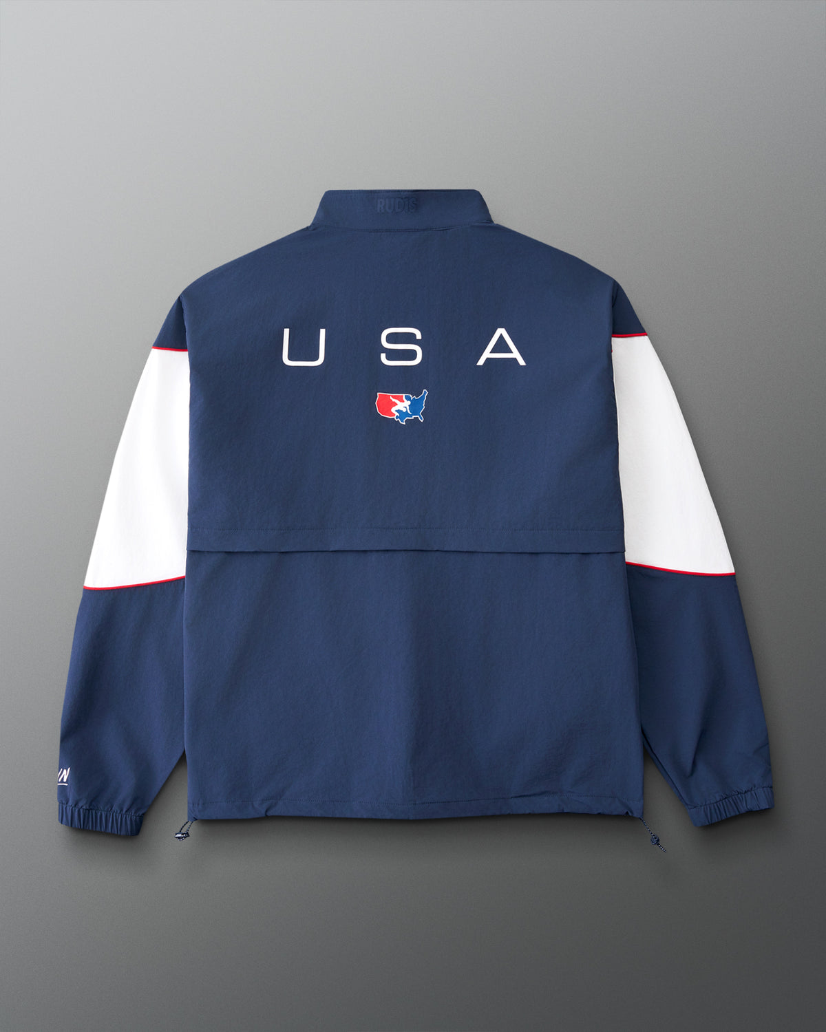 Back view of the RUDIS USA Wrestling Full Zip Movement Podium Jacket in navy, featuring large USA lettering, USA Wrestling logo, white sleeve panels, and red piping.