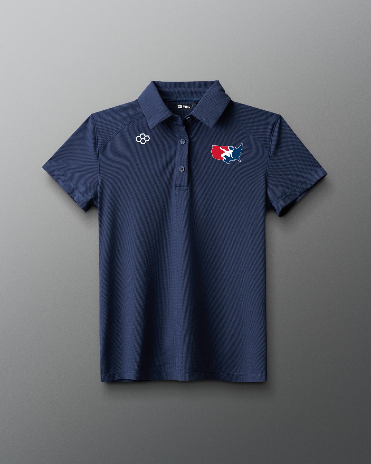 Navy blue polo shirt with logos on a gray background