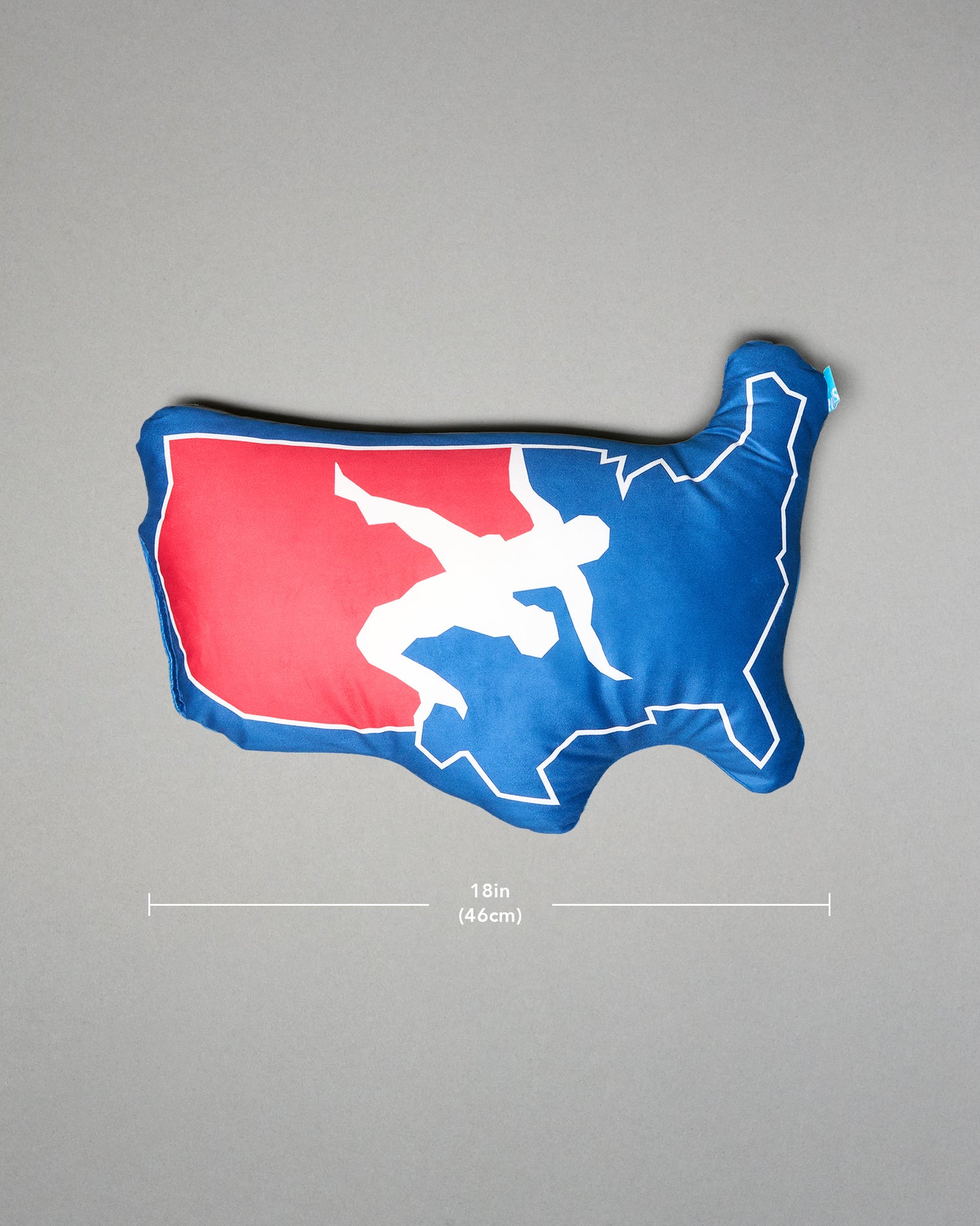 Pillow wiht USA map with a person design on a gray background