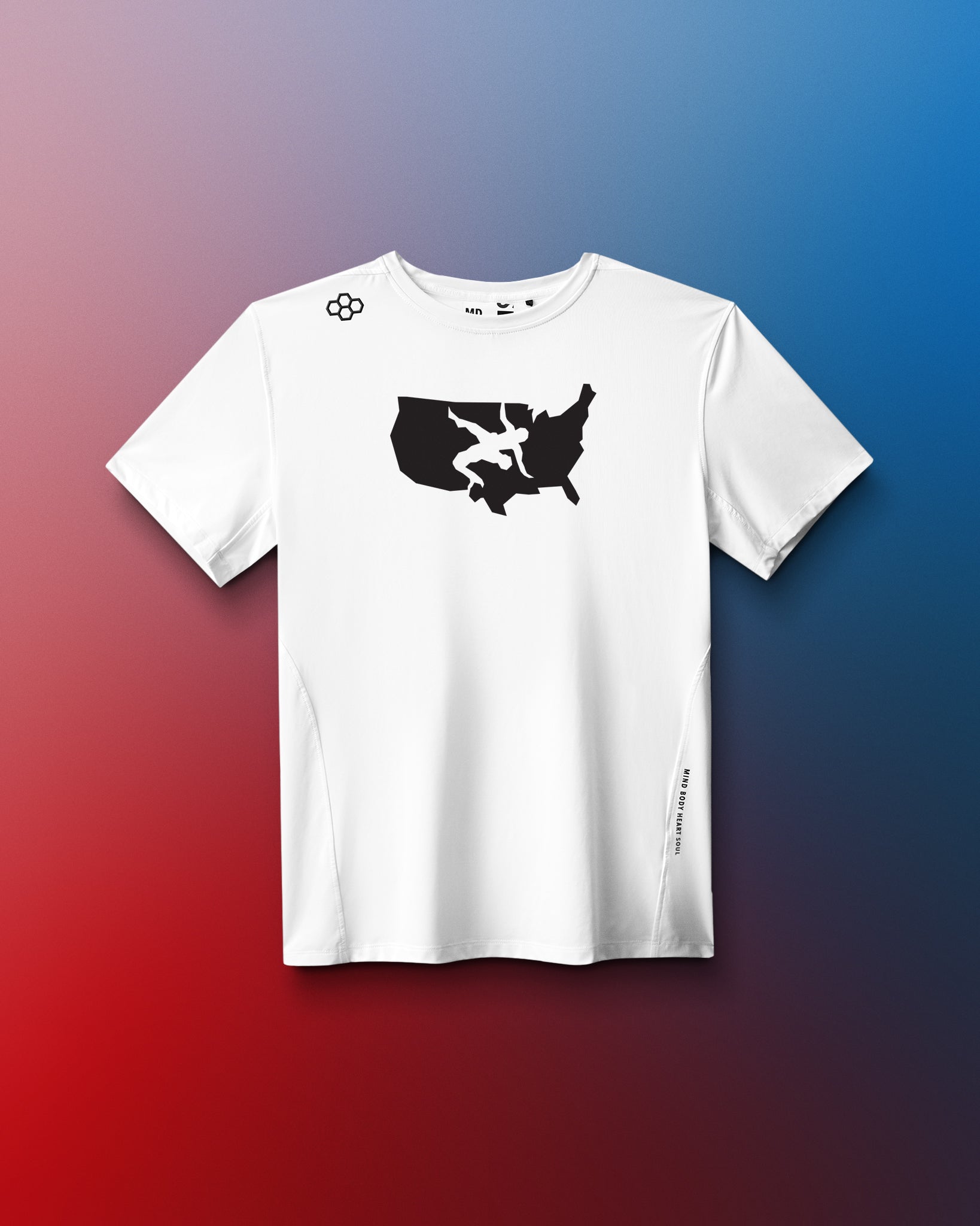 A white short-sleeve athletic T-shirt is displayed against a red-to-blue gradient background. Centered on the chest is a black silhouette of the continental United States with a white wrestling figure in action. A small RUDIS hex logo appears near the left shoulder. The shirt features a modern, fitted cut.