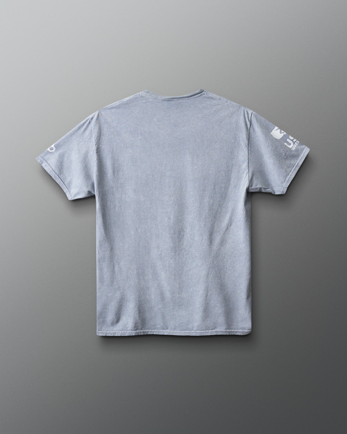 T-shirt épais délavé à l'acide avec logo de l'équipe de catch américaine