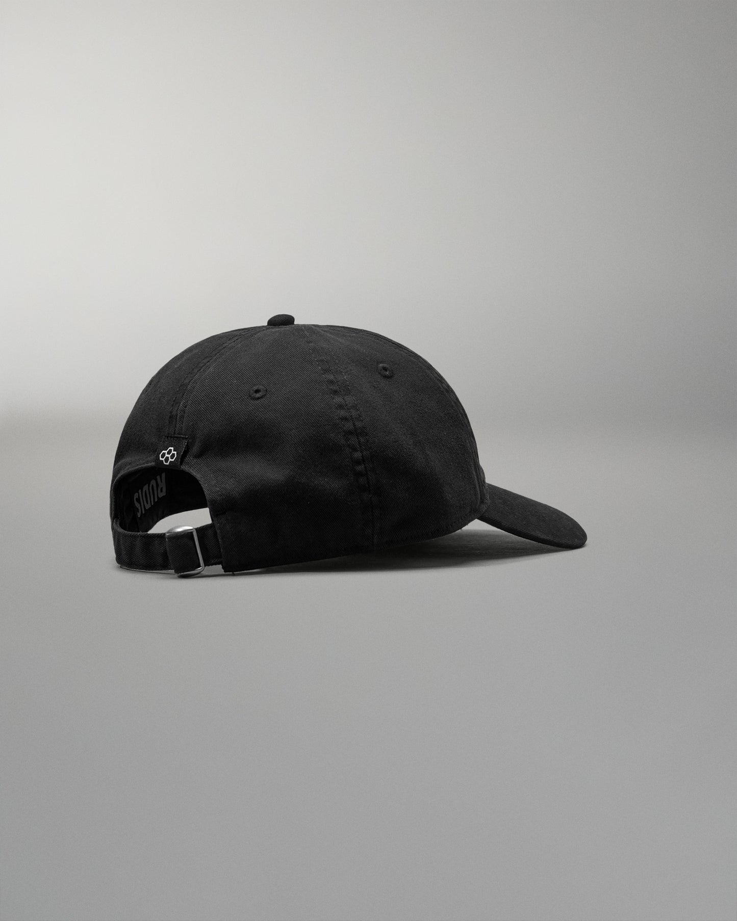 Black cap on a gray background