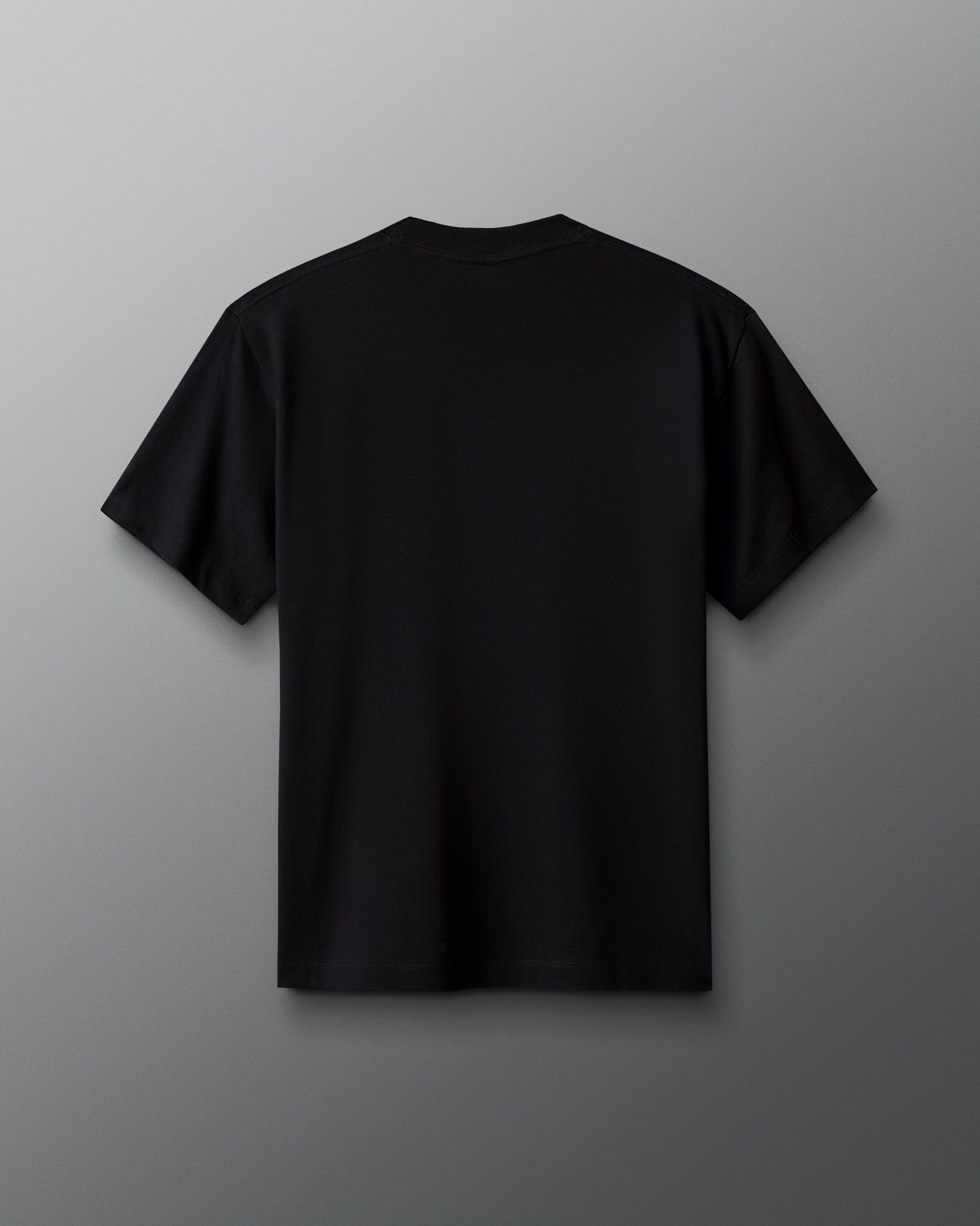 Black t-shirt on a gray background
