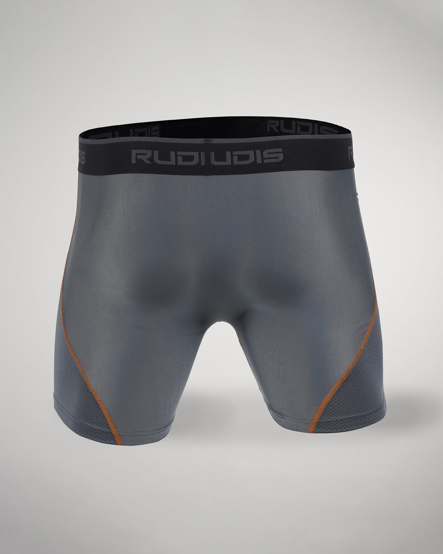 These athletic shorts feature a sleek gray design with a breathable construction and contrasting orange stitching for added style