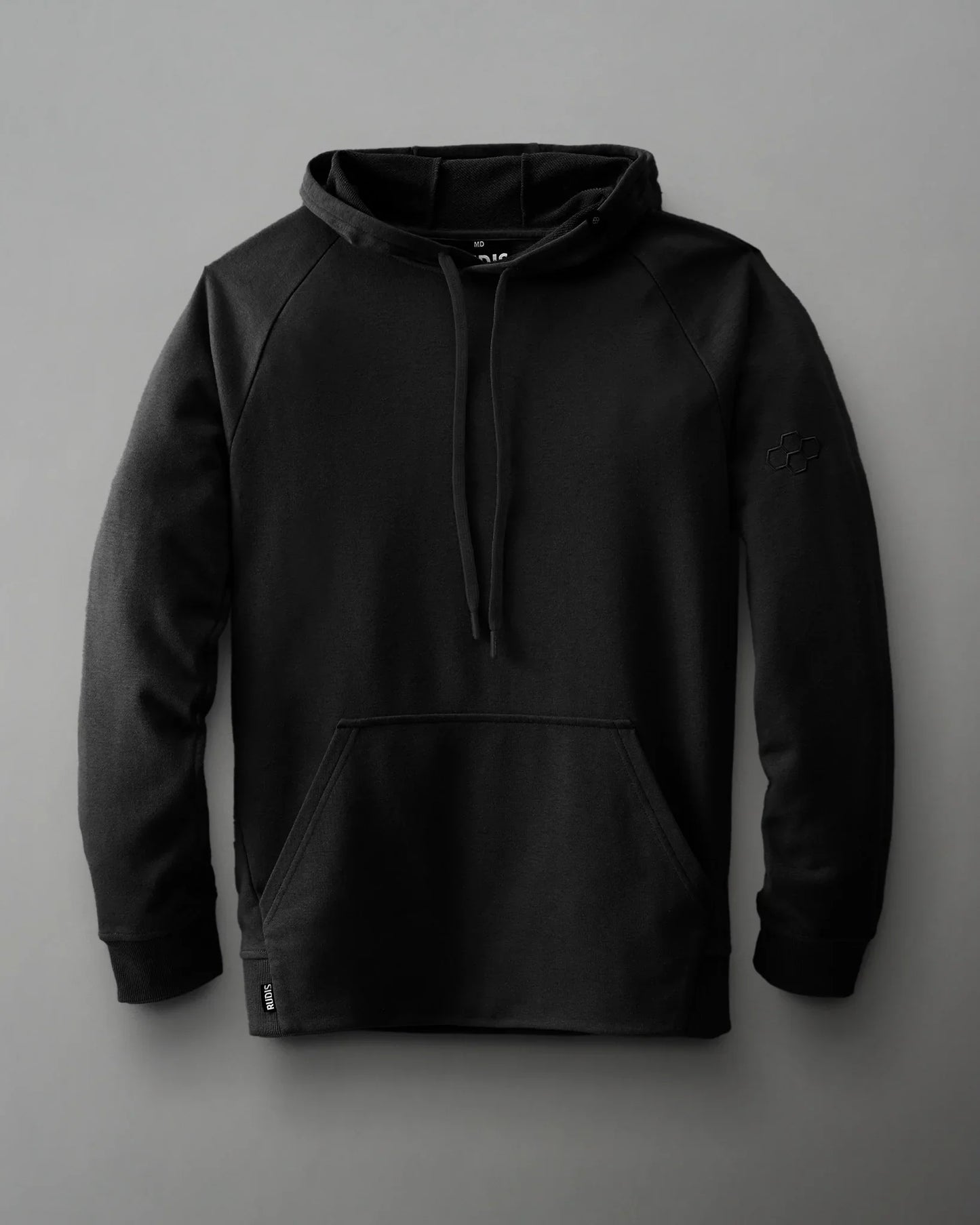 A black hoodie with a front pocket and adjustable drawstring hood is set against a gray background, combining comfort and minimalistic style.