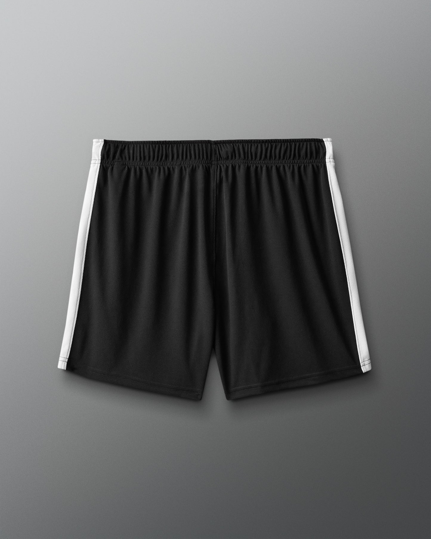 Black shorts with white stripes on a gray background