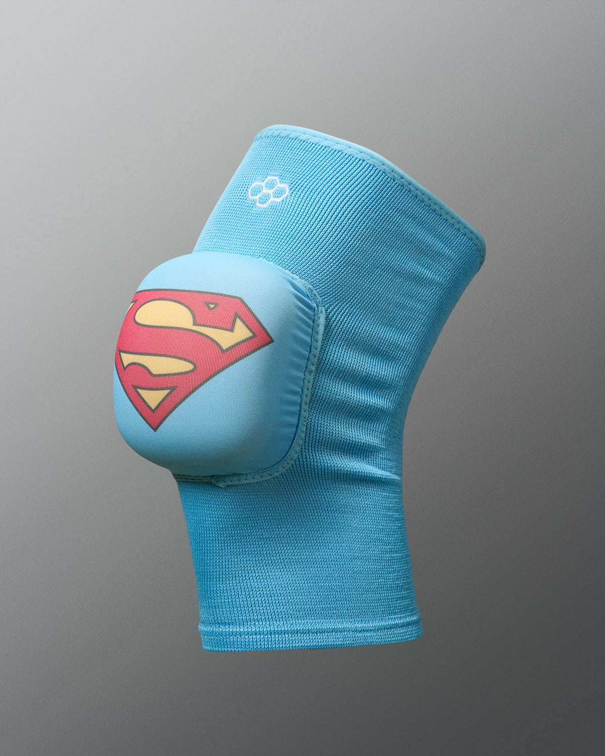 Blue RUDIS Superman Cushion Kneepad featuring a padded Superman shield and RUDIS logo.