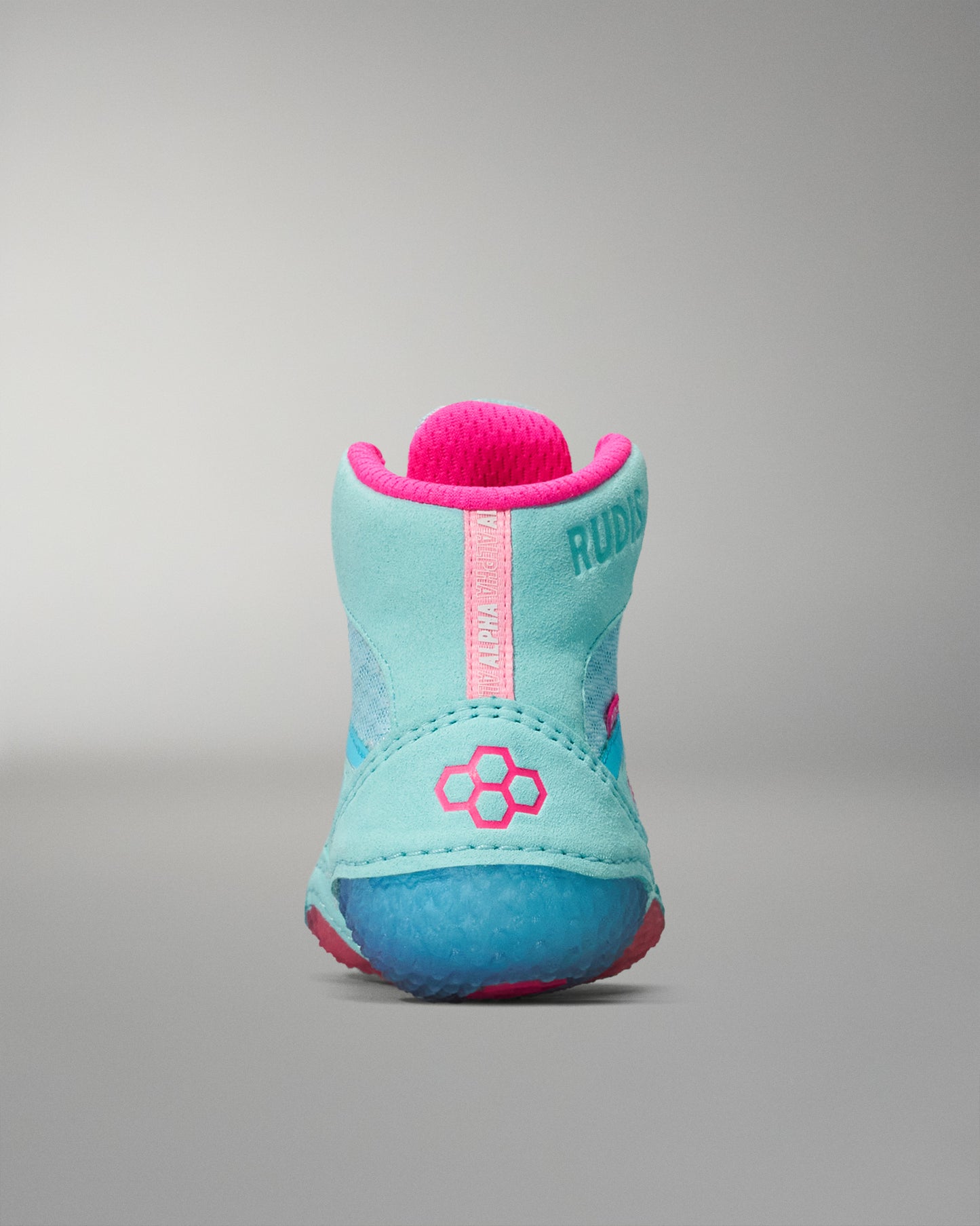 Turquoise and pink Wrestling Shoe with 'RUDIS' branding on a gray background
