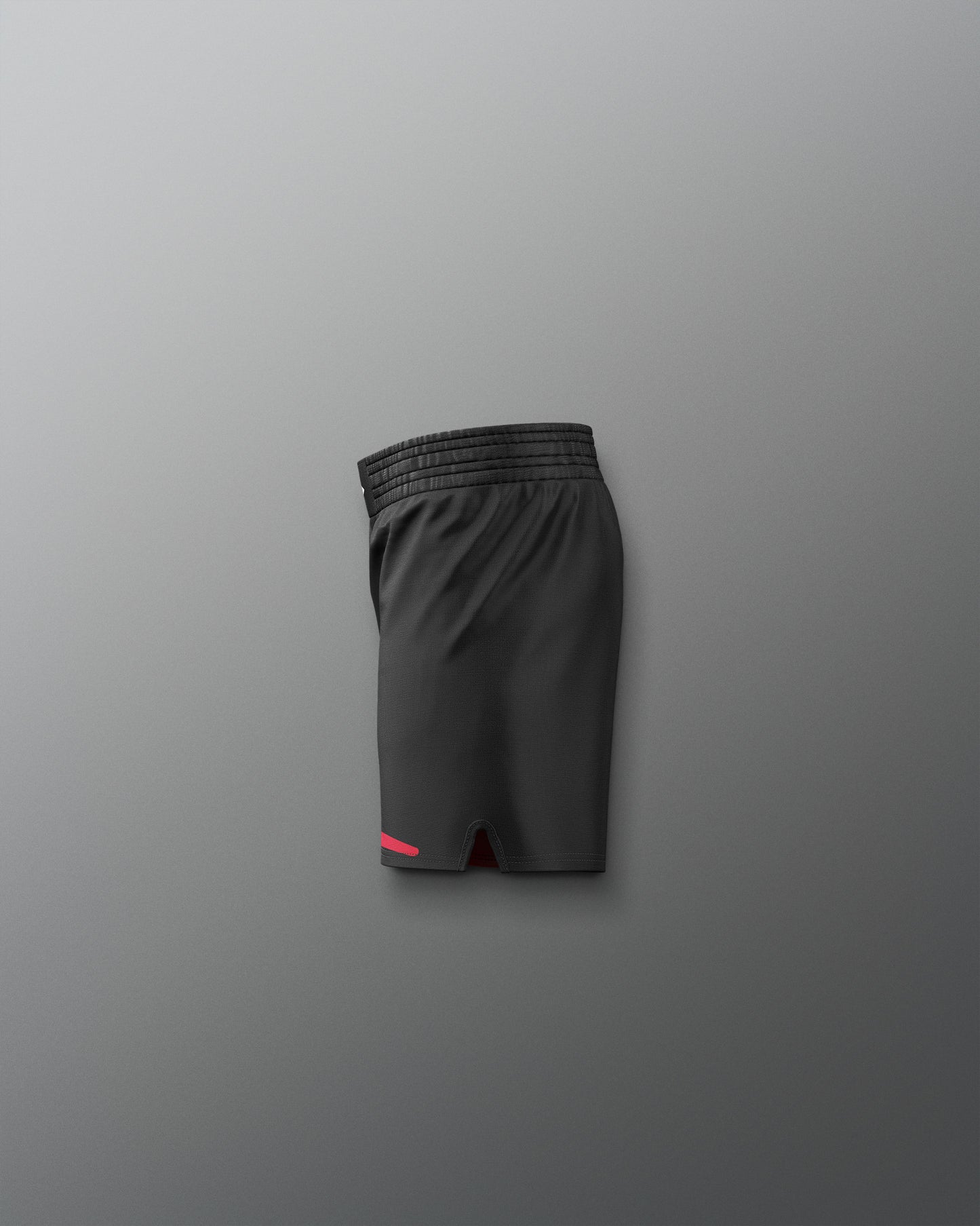 Black athletic shorts with a red 'Kolat' logo on a gray background