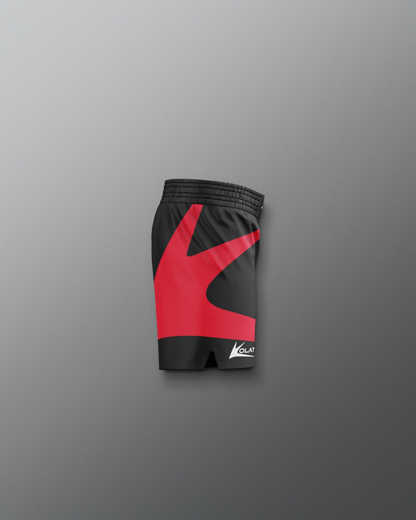 Black and red athletic shorts on a gray background