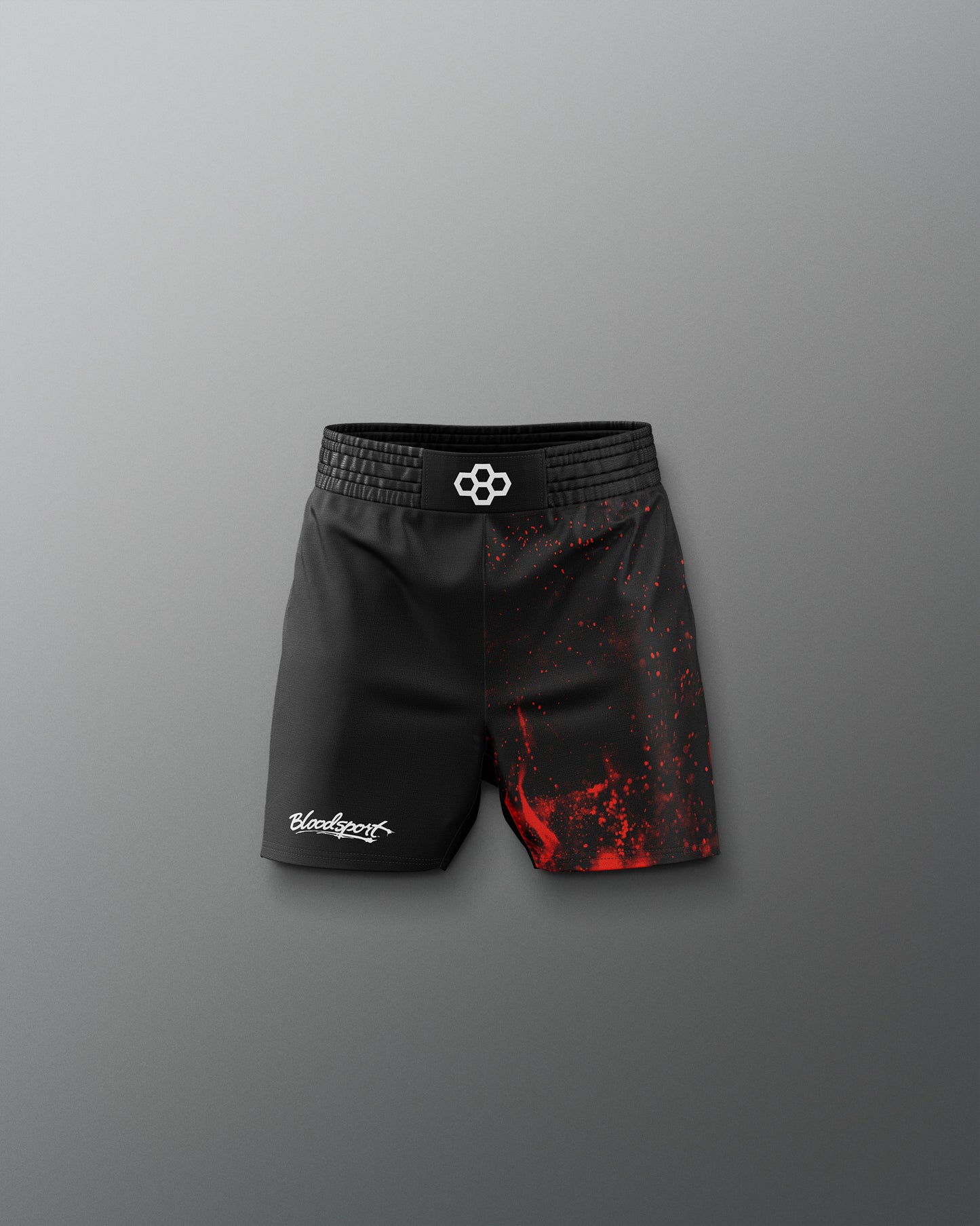 Black and red shorts with a brand logo on a gray background