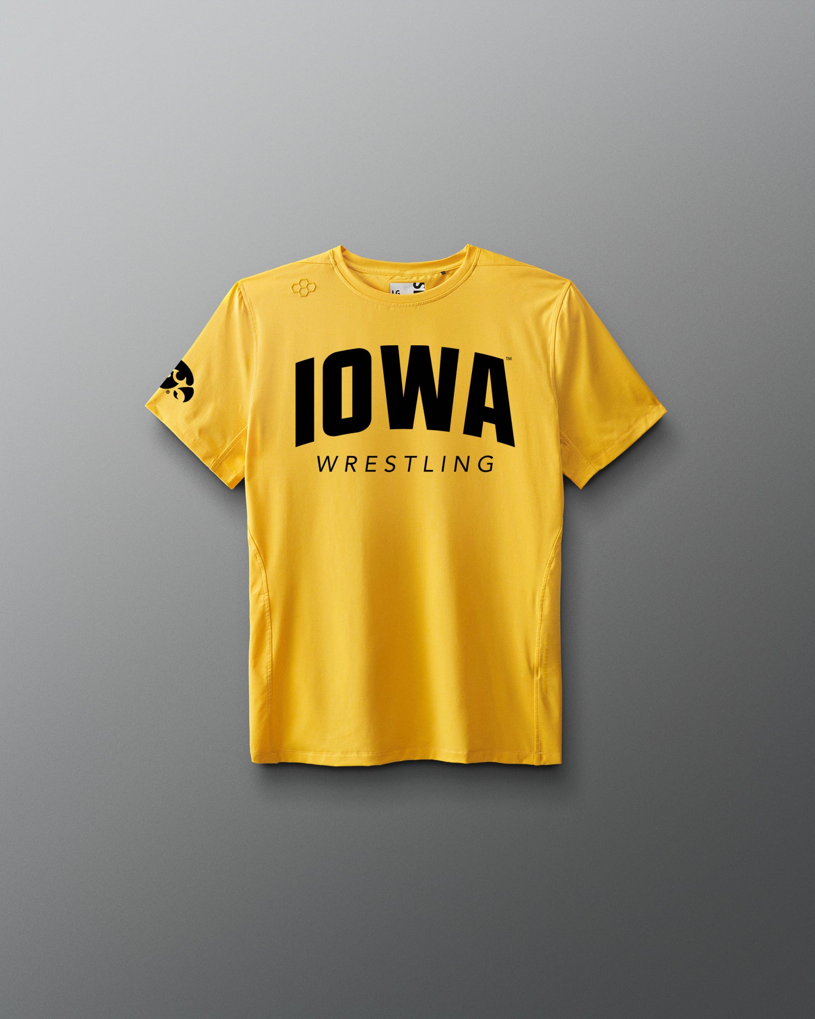 Yellow t-shirt with 'Iowa Wrestling' text on a gray background