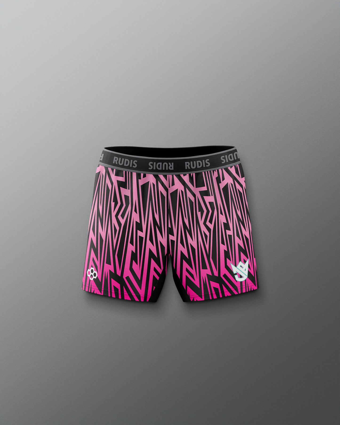 Pink and black patterned shorts with 'Rudis' branding on a gray background
