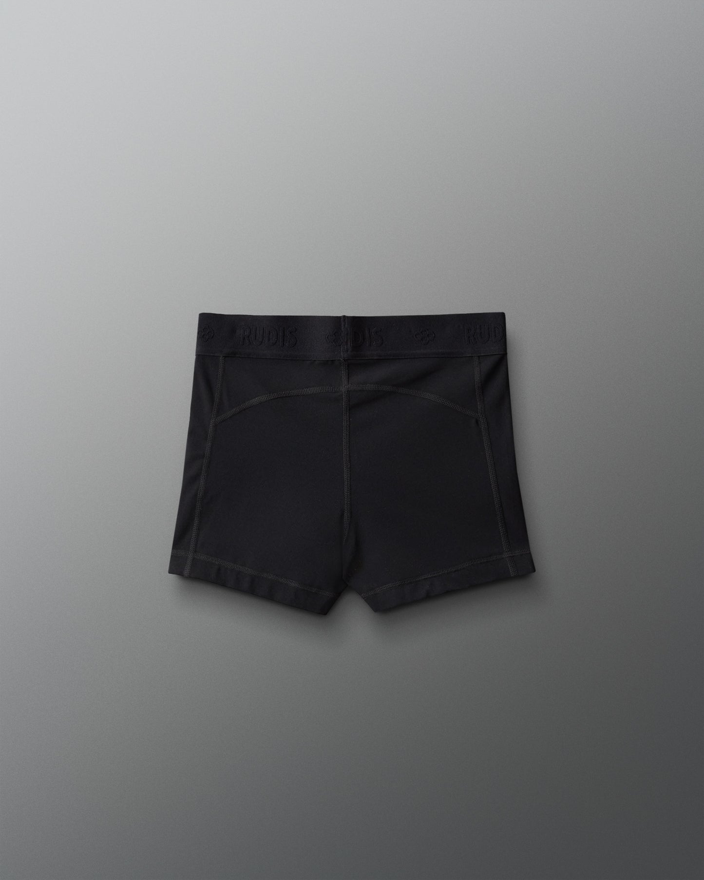 Black shorts on a gray background