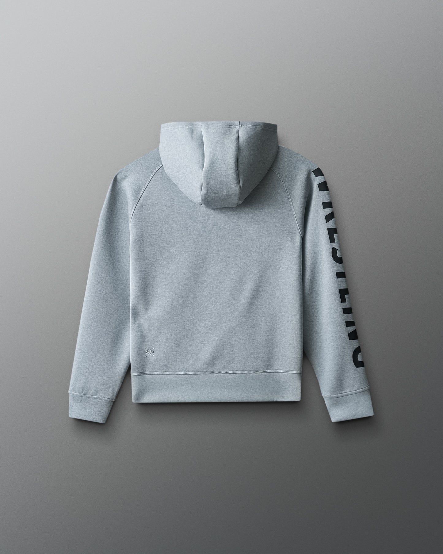 Gray hoodie with a brand logo on the sleeve against a gray background