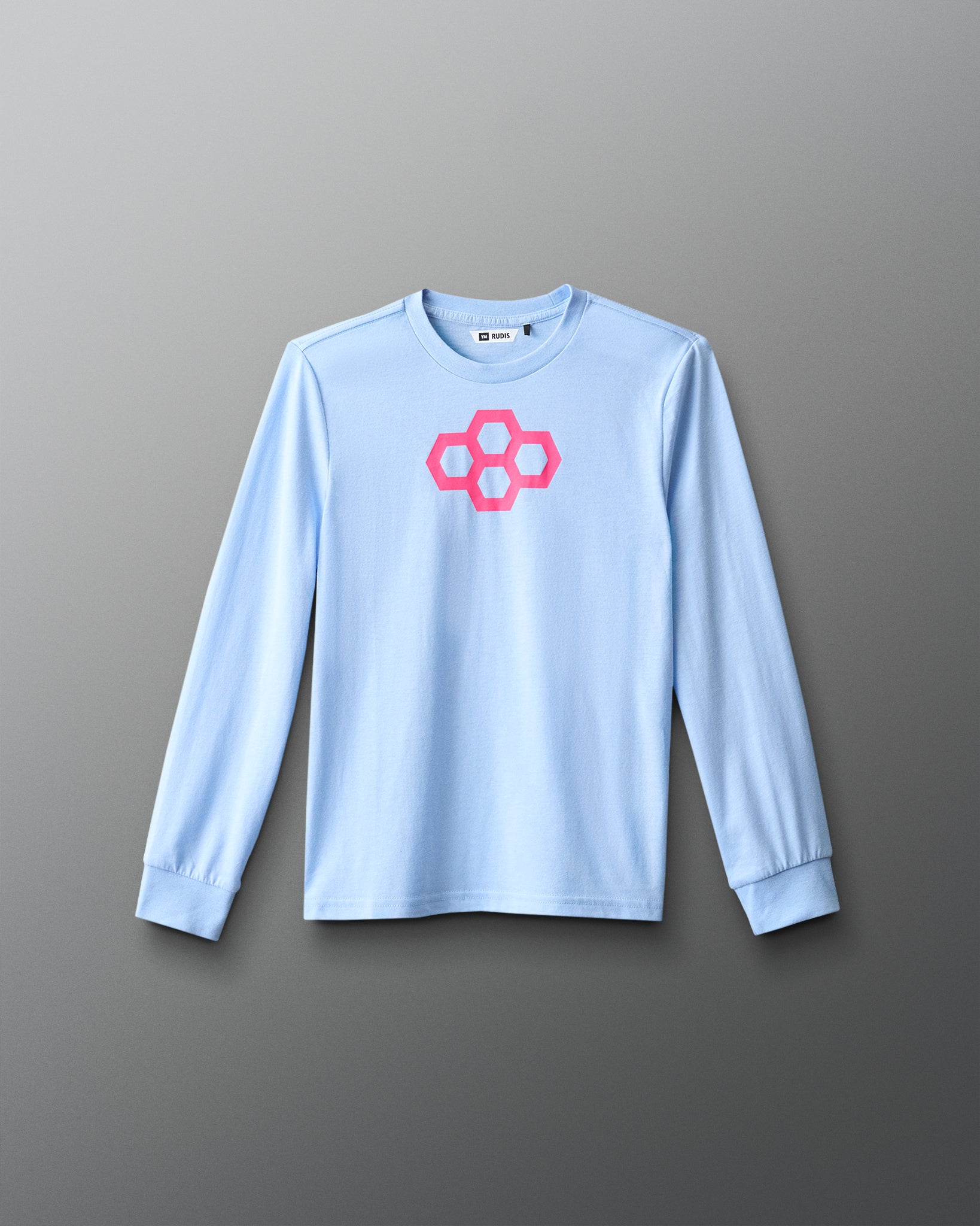Light blue long-sleeve shirt with a pink geometric logo on a gray background
