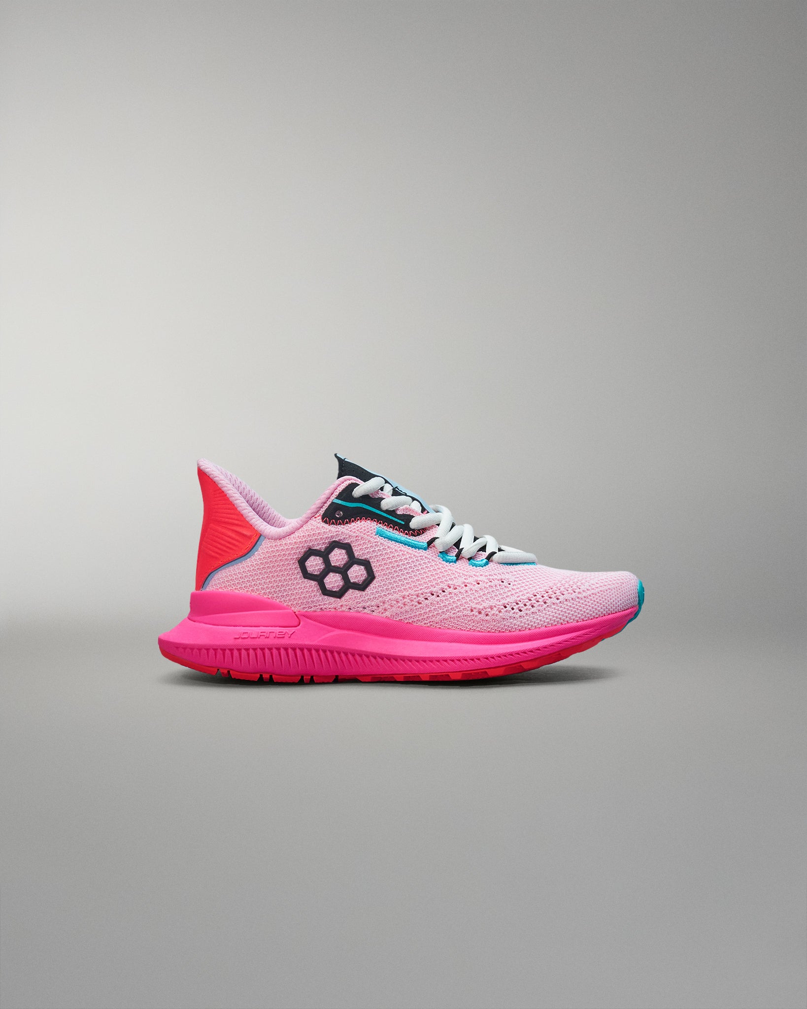 Pink running shoe with black logo on a gray background