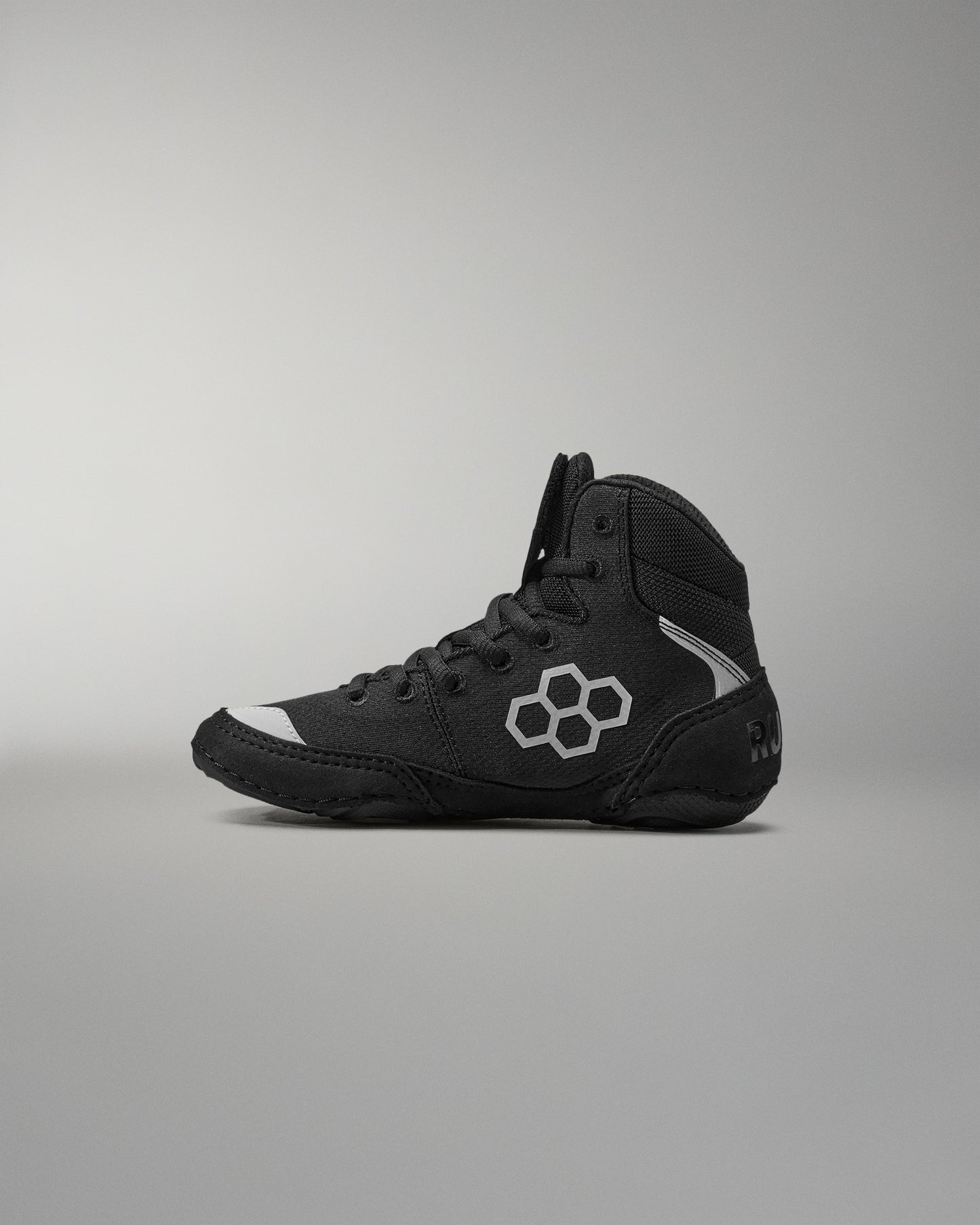 Black Wrestling Shoes with a logo on a gray background