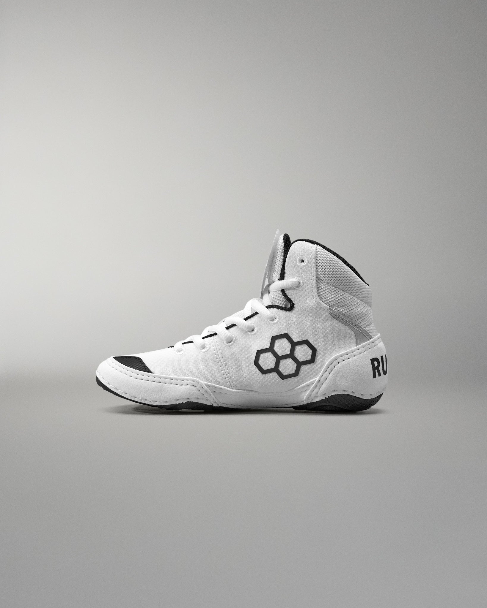 White Wrestling Shoe with black accents on a gray background