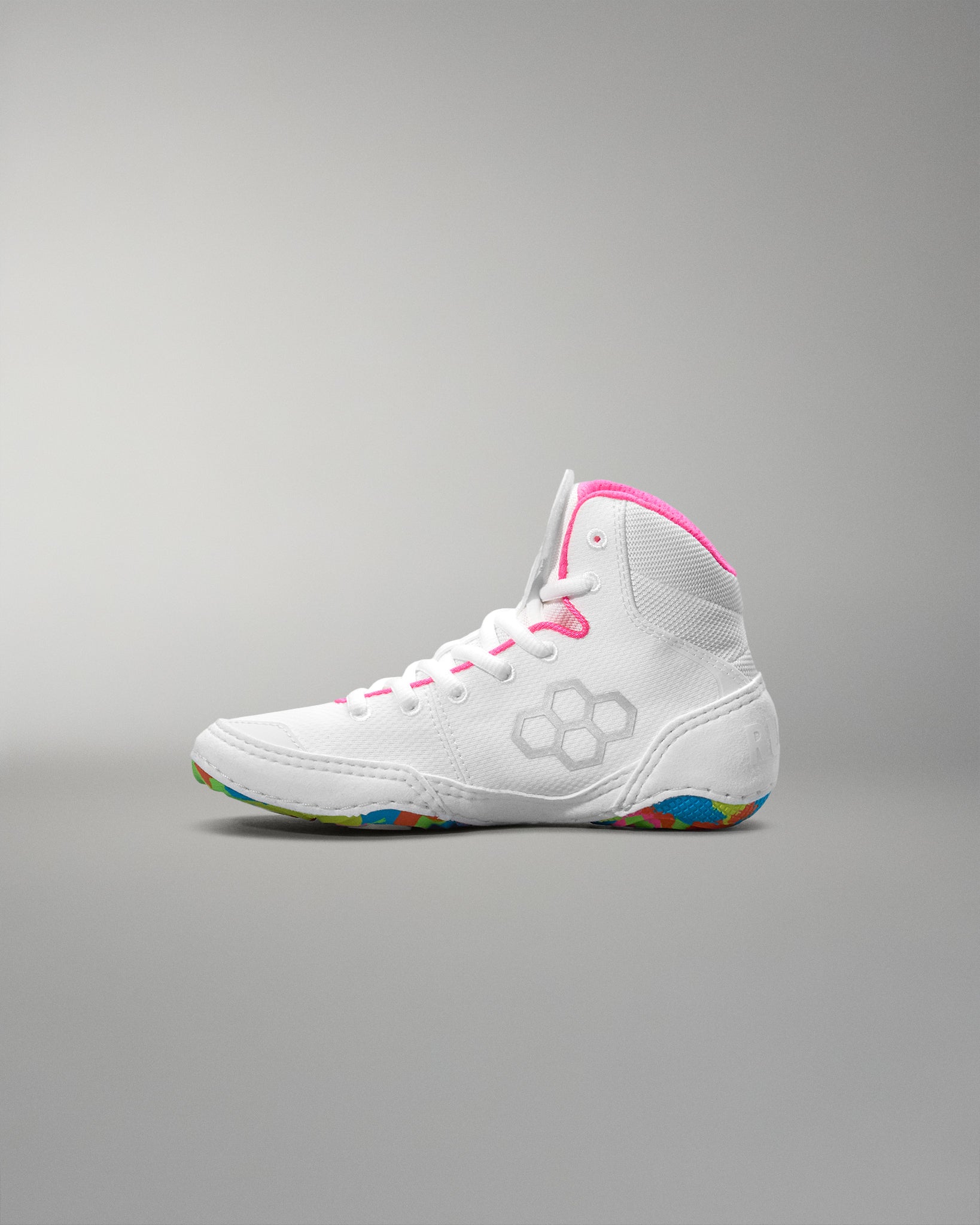 White wrestling shoe with colorful sole on a gray background