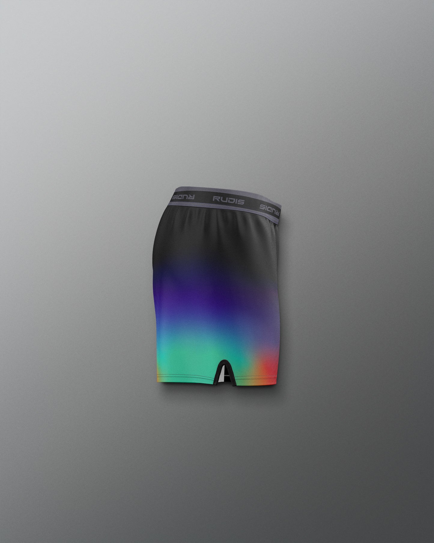 Multicolored athletic shorts on a gray background