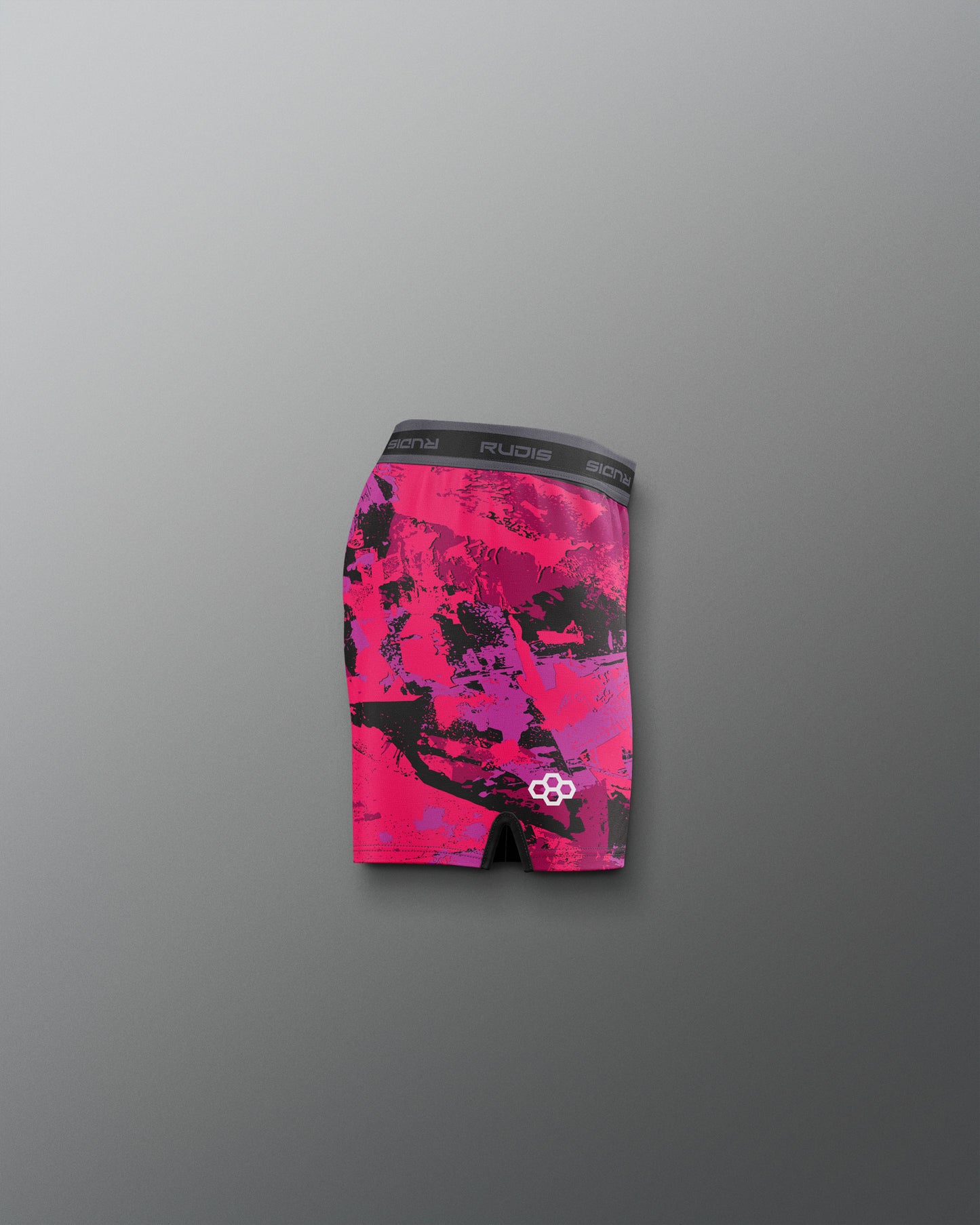 Pink and black patterned underwear on a gray background