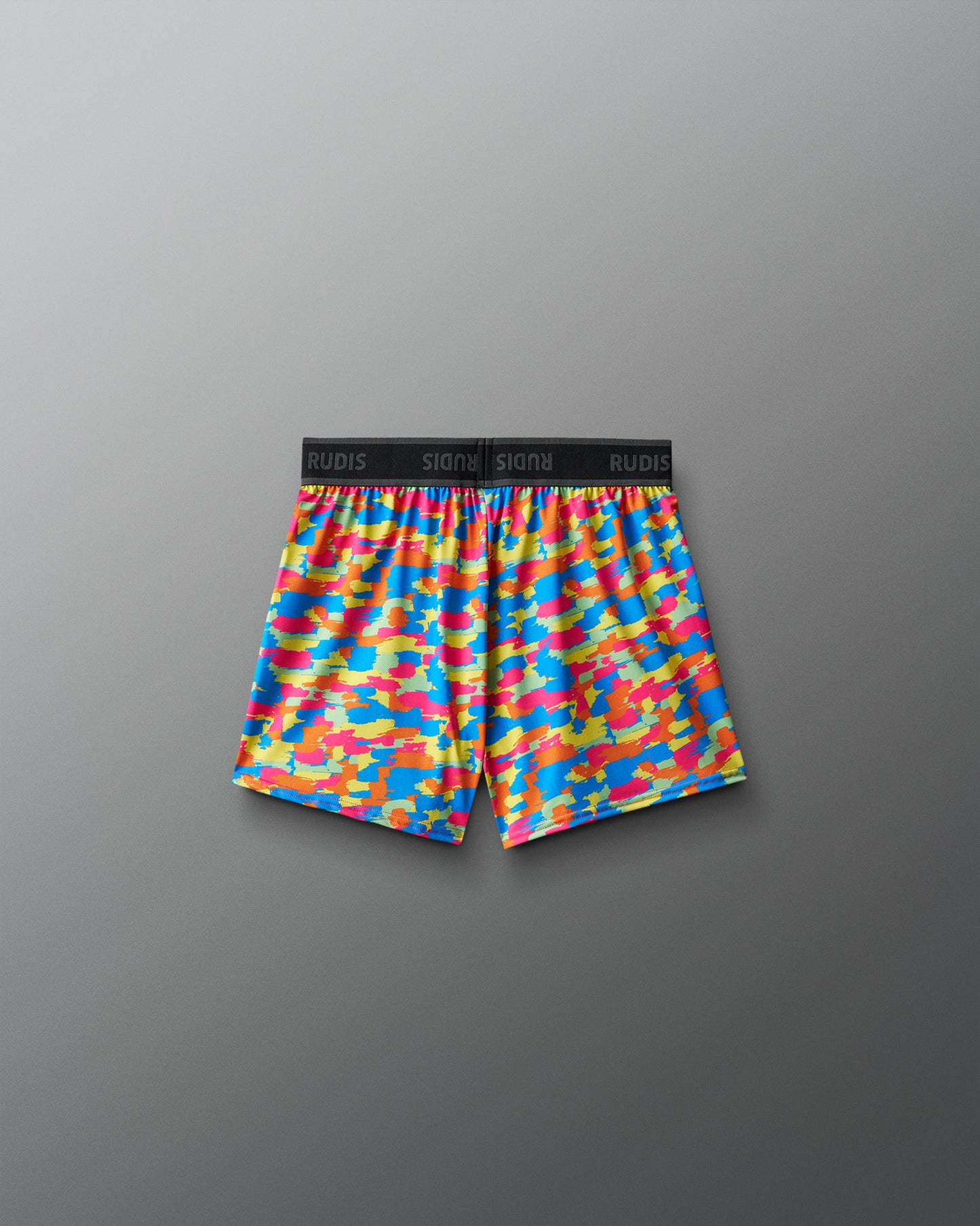Colorful patterned shorts on a gray background