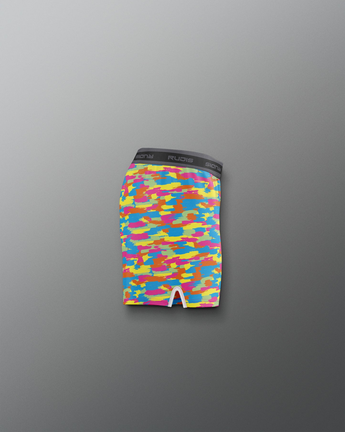 Colorful camouflage-patterned underwear on a gray background