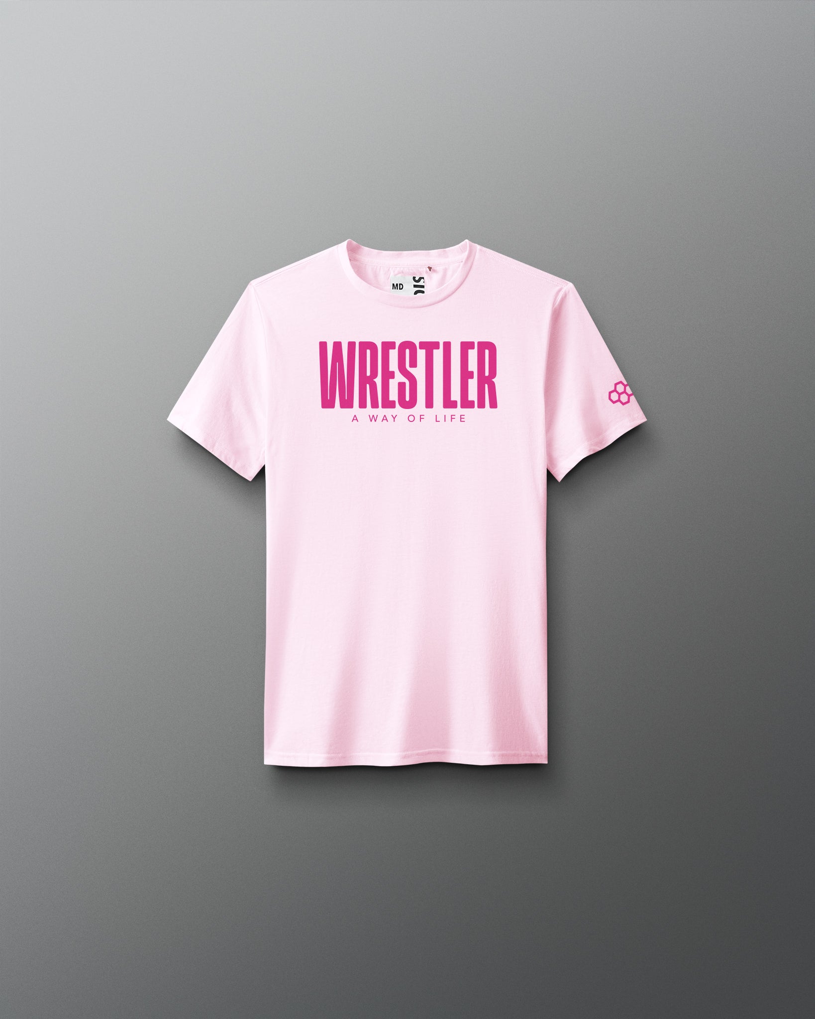 Pink t-shirt with 'Wrestler A Way of Life' text on a gray background