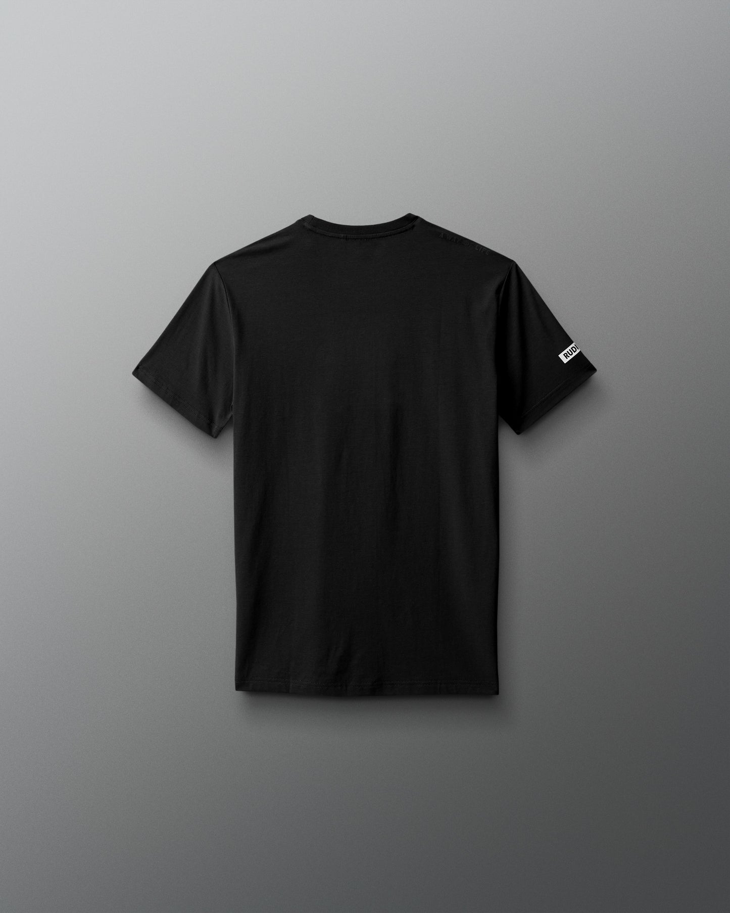 Black t-shirt on a gray background