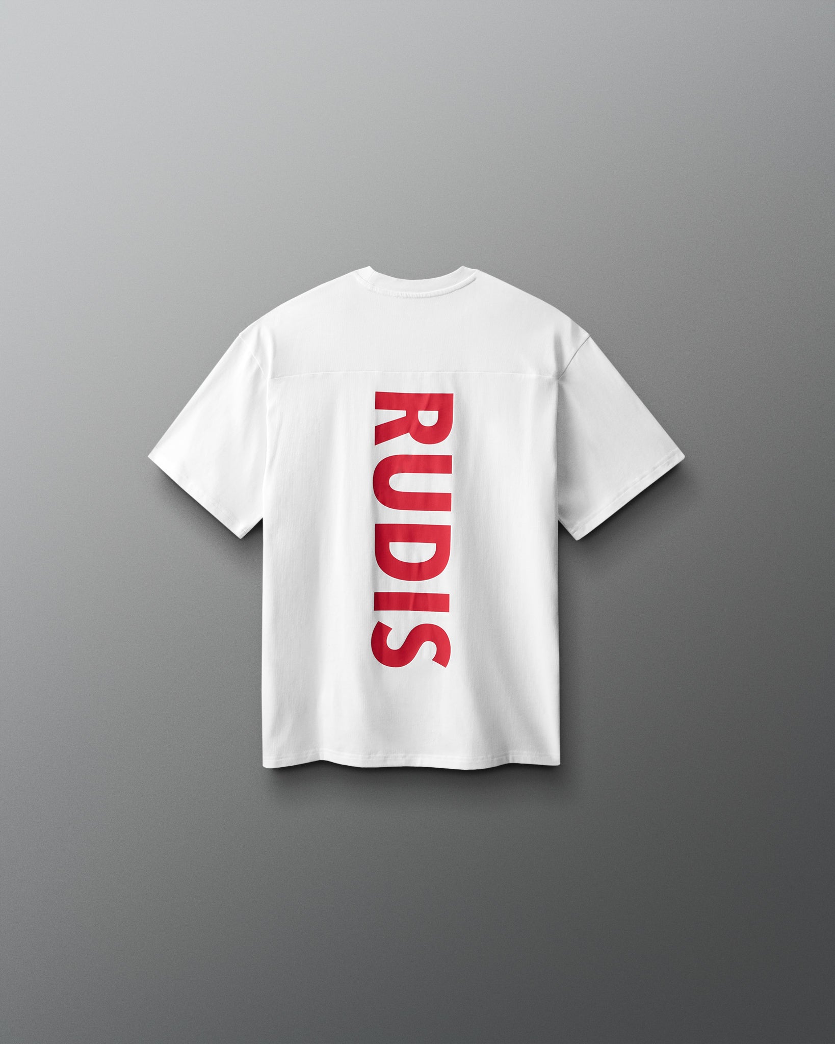 White t-shirt with 'RUDIS' printed on the back against a gray background