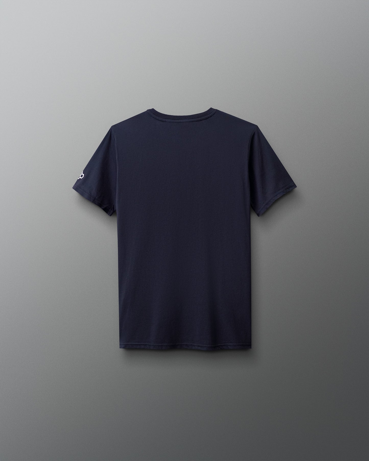 Navy blue t-shirt on a gray background