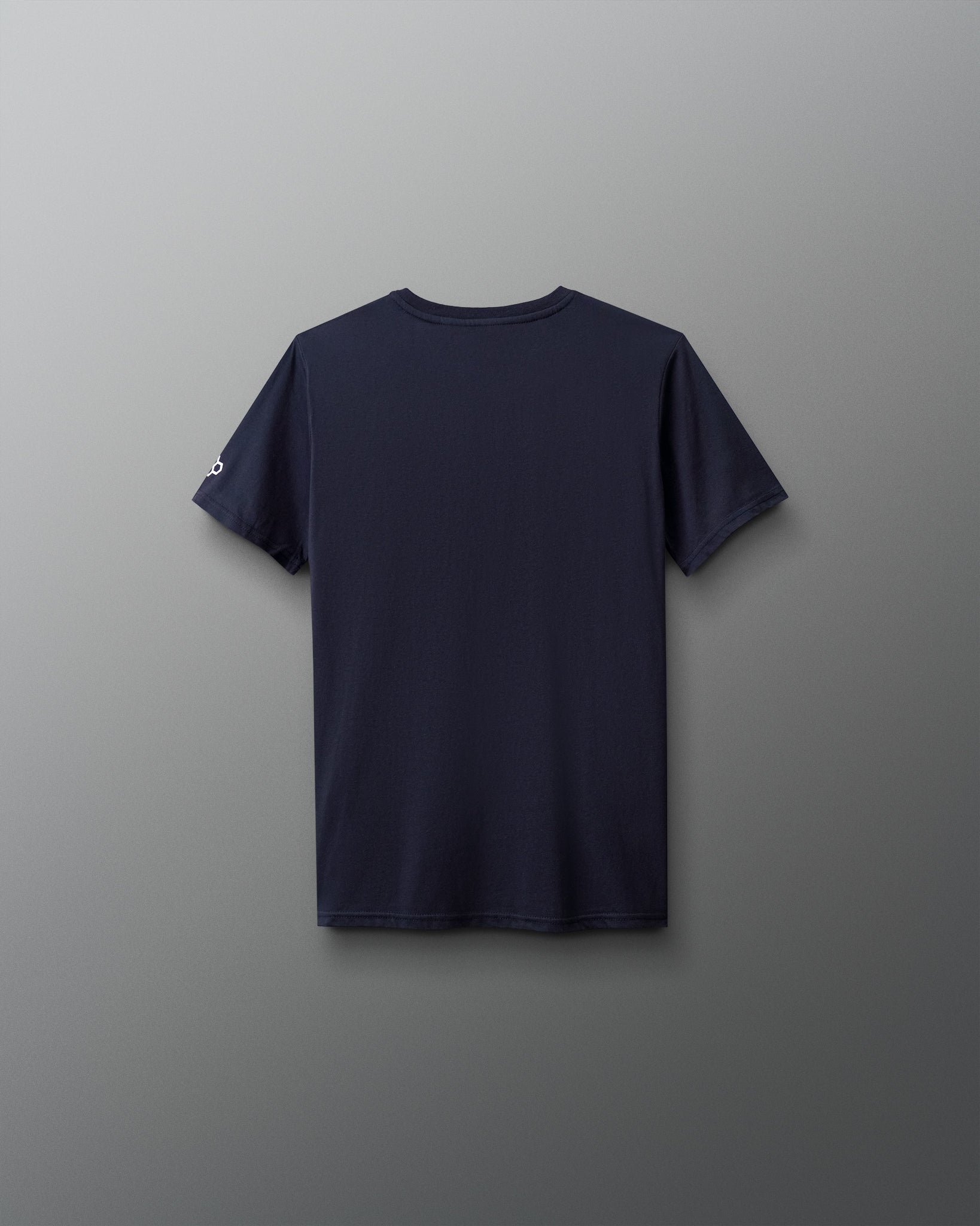 Navy blue t-shirt on a gray background