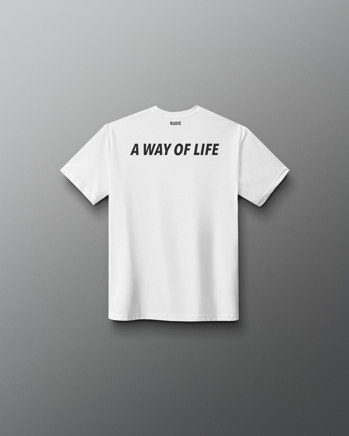Back view of the youth white RUDIS Core Flag Elite Super Soft T-Shirt, featuring bold black “A WAY OF LIFE” lettering across the upper back with RUDIS branding at the neckline.