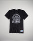A black t-shirt commemorating athlete Jesse Owens with text highlighting his achievements at the 1936 Berlin Olympics