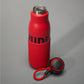 A vibrant red insulated water bottle with a textured bottom and black branding accompanied by a matching lid handle