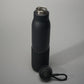 A sleek black insulated water bottle featuring a textured grip and a stainless steel opening accompanied by a detachable lid with a loop for easy carrying