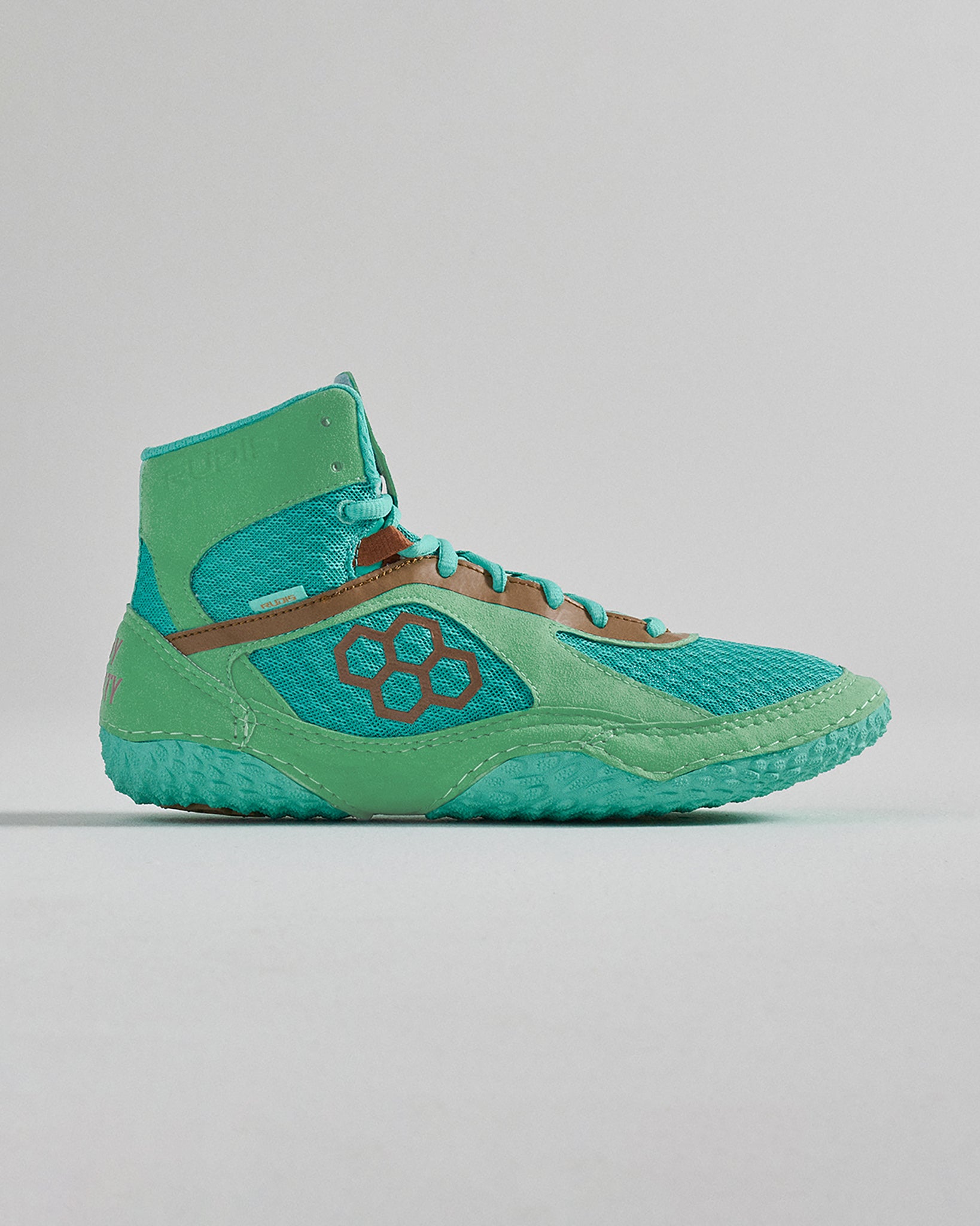 A modern high-top athletic shoe in turquoise with brown accents designed for performance and style