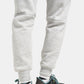 Light gray sweatpants with a snug fit and a motivational phrase designed for casual wear and comfort