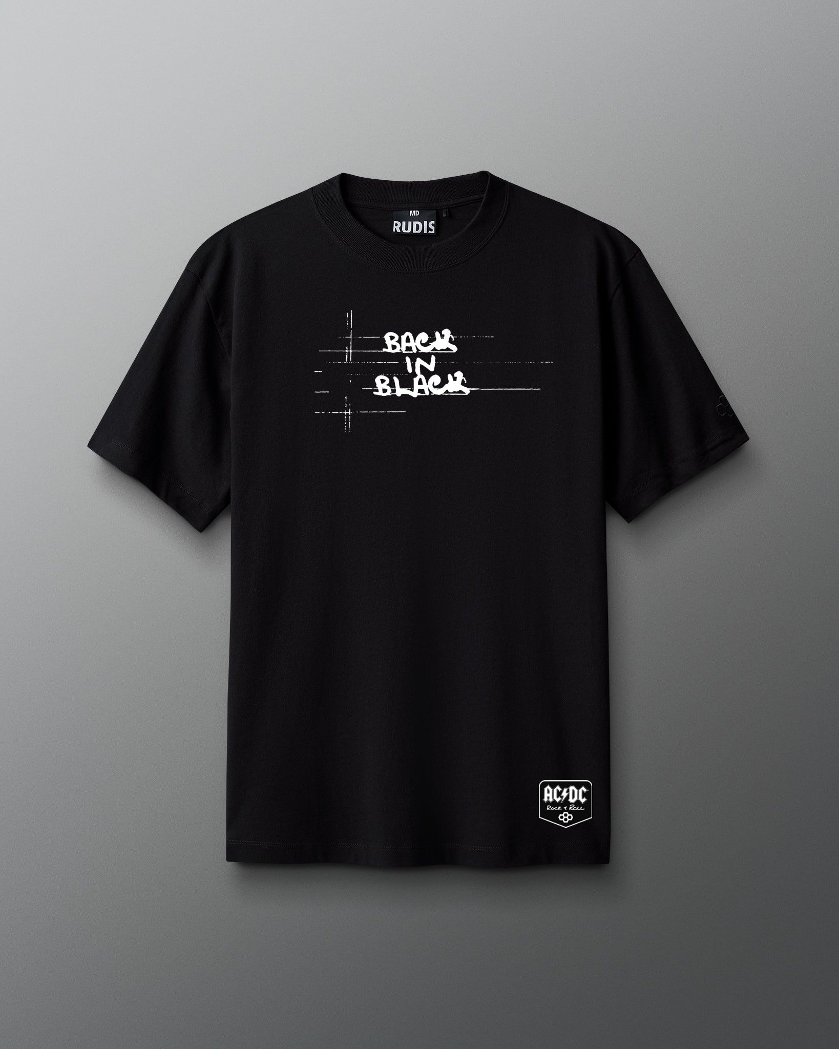 Black t-shirt with white text and logos on a gray background